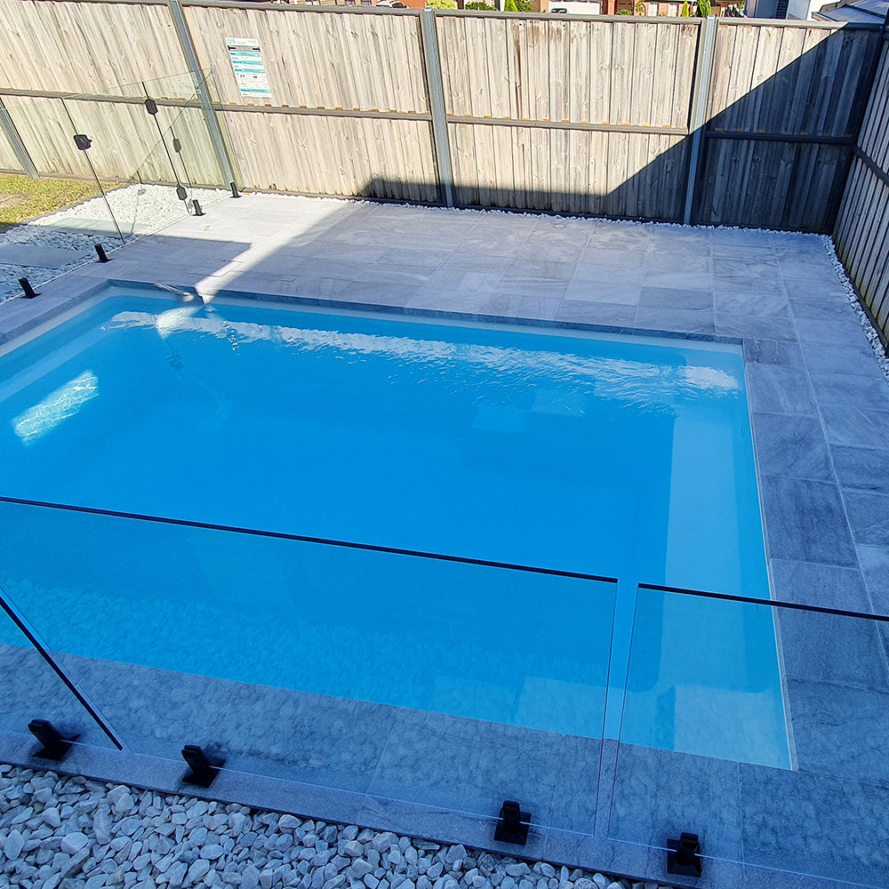 Argento Sandblasted Tumbled Limestone 600x400x30mm Natural Stone Pavers - 1st Quality - Pool Picture - Available at Simon's Seconds