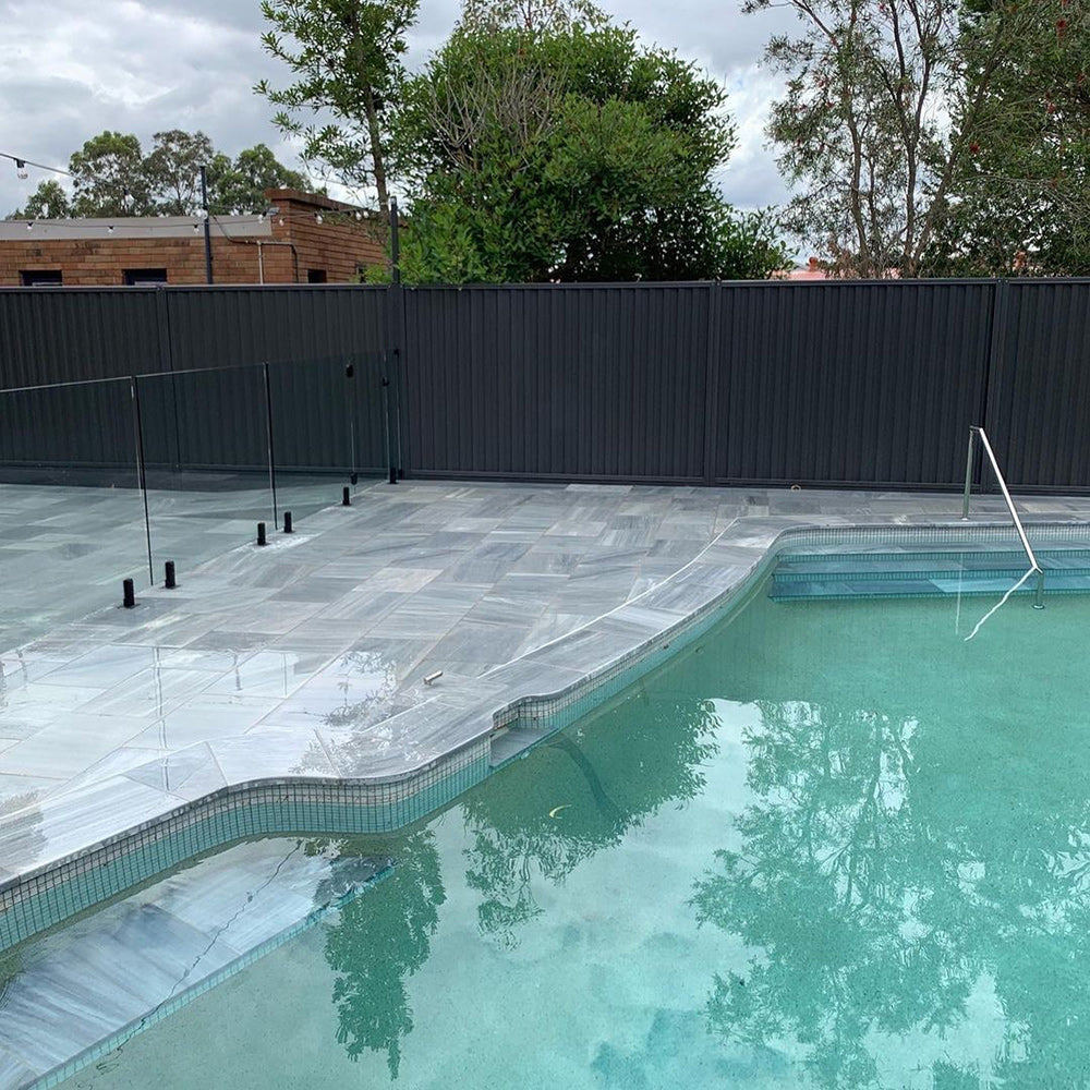 Blue Sky Limestone 600x400x30/60mm Drop Nose Coping - 1st Quality - Laid around Pool - Available at Simon's Seconds