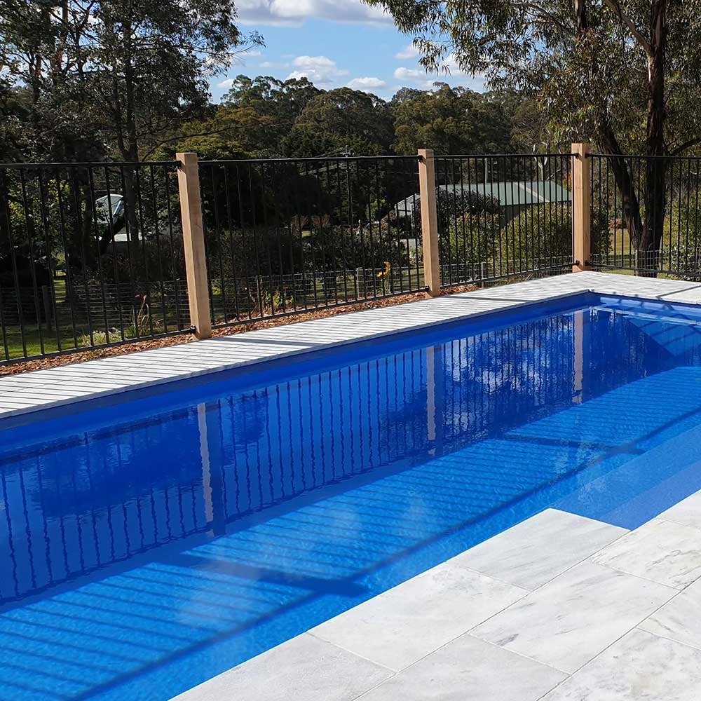 Luce Grey Sandblasted Tumbled Limestone 600x400x30mm Natural Stone Pavers - 1st Quality - Laid Around Swimming Pool - Available at Simon's Seconds